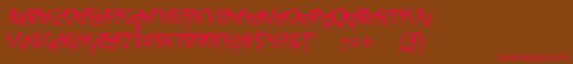 フォントSlapHappy – 赤い文字が茶色の背景にあります。