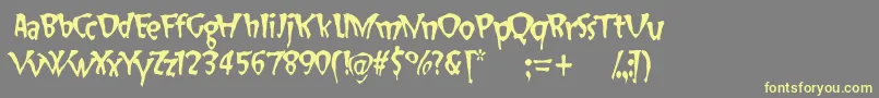 フォントSlapHappy – 黄色のフォント、灰色の背景