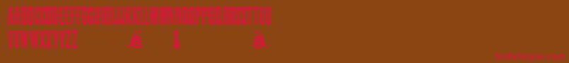 フォントSnakebiteSaloon – 赤い文字が茶色の背景にあります。