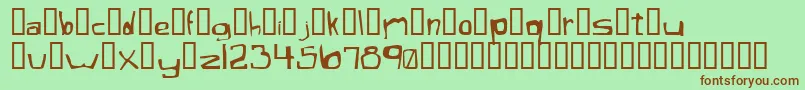 XaficuleOddtype-Schriftart – Braune Schriften auf grünem Hintergrund