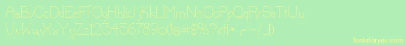 Lorena Font – Yellow Fonts on Green Background
