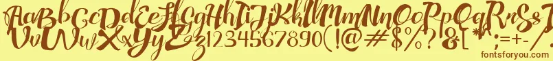 AdefebiaFreeFont Font – Brown Fonts on Yellow Background