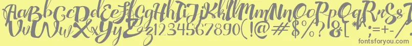 AdefebiaFreeFont Font – Gray Fonts on Yellow Background