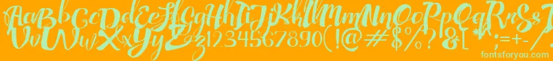 AdefebiaFreeFont Font – Green Fonts on Orange Background