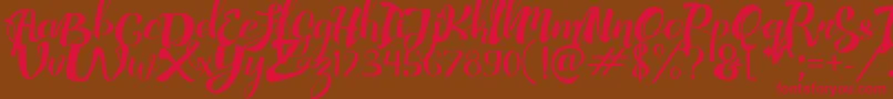 AdefebiaFreeFont Font – Red Fonts on Brown Background