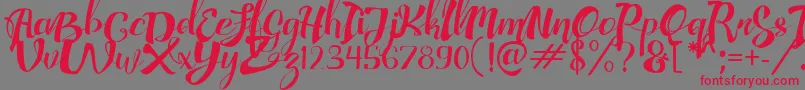 AdefebiaFreeFont Font – Red Fonts on Gray Background