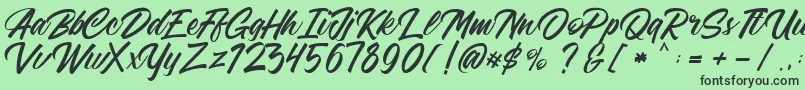 フォントFreeAdelaide – 緑の背景に黒い文字