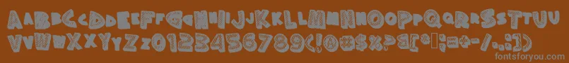フォントSilly – 茶色の背景に灰色の文字