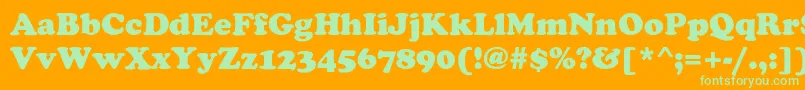 FennimoreHeavy Font – Green Fonts on Orange Background