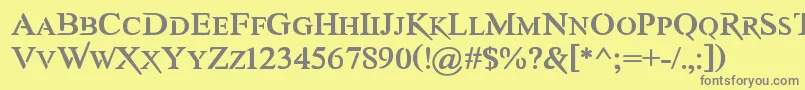 AwerySc-fontti – harmaat kirjasimet keltaisella taustalla