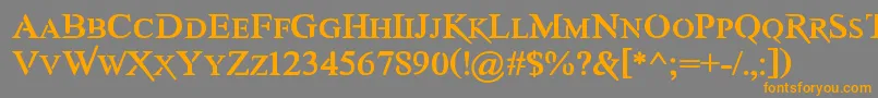 フォントAwerySc – オレンジの文字は灰色の背景にあります。