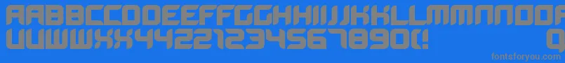 フォントBloodwaxbold – 青い背景に灰色の文字