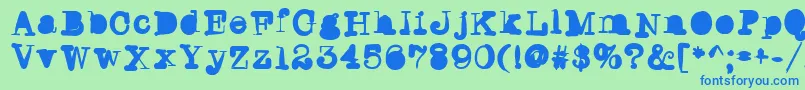 Writersblock Font – Blue Fonts on Green Background