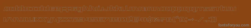 Ultramarinesout-fontti – harmaat kirjasimet ruskealla taustalla