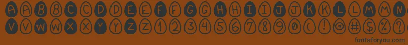EasterfontSt Font – Black Fonts on Brown Background