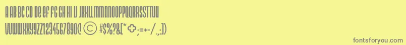 フォントNeonlightdbNormal – 黄色の背景に灰色の文字