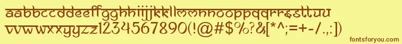 フォントAnandaNamaste – 茶色の文字が黄色の背景にあります。