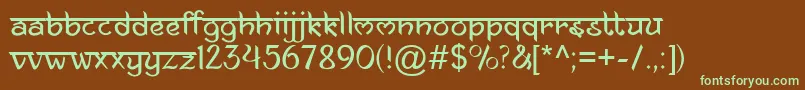 フォントAnandaNamaste – 緑色の文字が茶色の背景にあります。