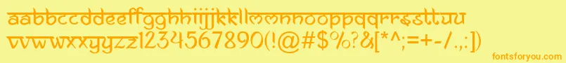 フォントAnandaNamaste – オレンジの文字が黄色の背景にあります。