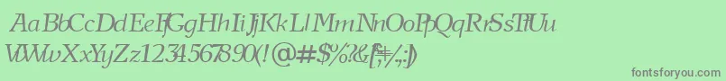 Fonte NewjournalCyrillicItalic – fontes cinzas em um fundo verde