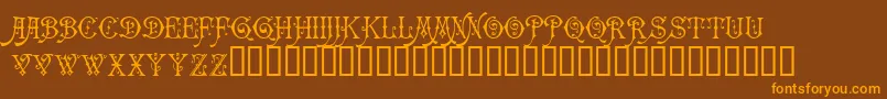 Carmencita-Schriftart – Orangefarbene Schriften auf braunem Hintergrund