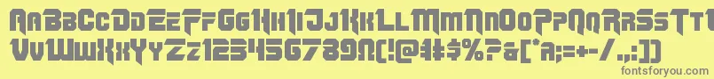 Omegaforce11-fontti – harmaat kirjasimet keltaisella taustalla