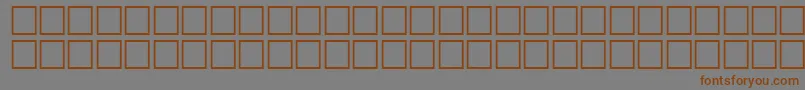 フォントQuiverRegular – 茶色の文字が灰色の背景にあります。