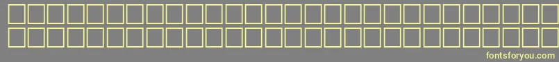 QuiverRegular-Schriftart – Gelbe Schriften auf grauem Hintergrund