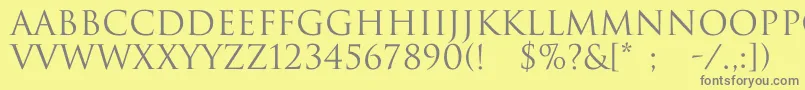 Trajax Font – Gray Fonts on Yellow Background