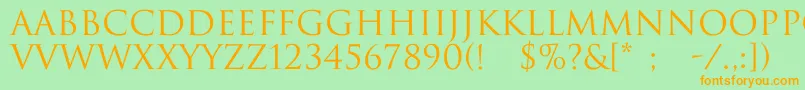 フォントTrajax – オレンジの文字が緑の背景にあります。