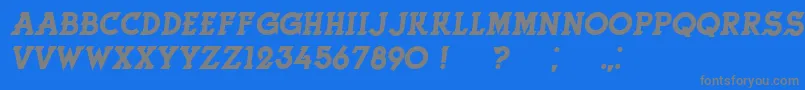 HerneItalic-fontti – harmaat kirjasimet sinisellä taustalla