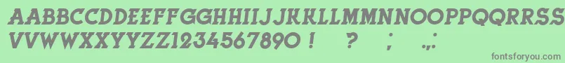 HerneItalic-fontti – harmaat kirjasimet vihreällä taustalla
