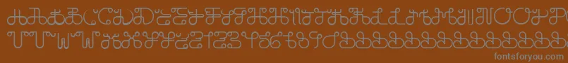DobilasSteady-fontti – harmaat kirjasimet ruskealla taustalla