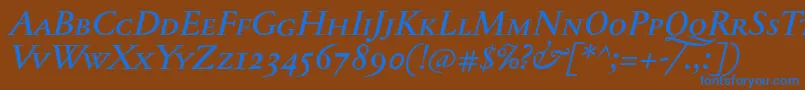 フォントJannontextmedscItalic – 茶色の背景に青い文字