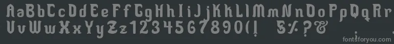 フォントMedusaScript – 黒い背景に灰色の文字