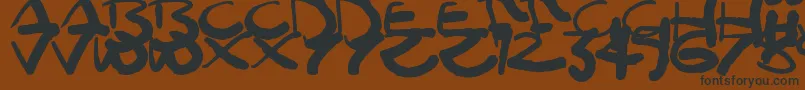 Moomoo-fontti – mustat fontit ruskealla taustalla