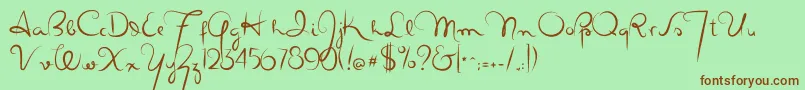 Шрифт Masanascript4silueta – коричневые шрифты на зелёном фоне