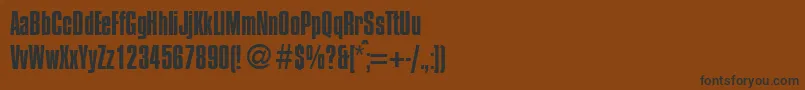 フォントCompressedRegularDb – 黒い文字が茶色の背景にあります