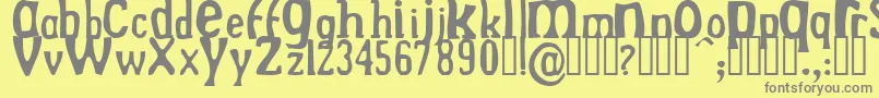 Drekn Font – Gray Fonts on Yellow Background