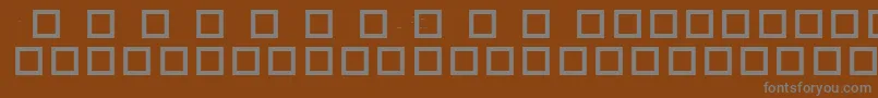 RobotCrisisDingbats Font – Gray Fonts on Brown Background