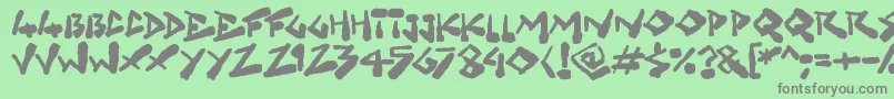 Grungelings Font – Gray Fonts on Green Background