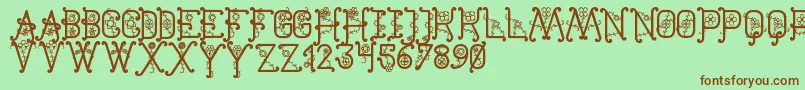 TheFlowersSt Font – Brown Fonts on Green Background