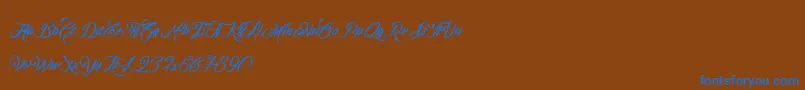 OmbelineLudolphides Font – Blue Fonts on Brown Background