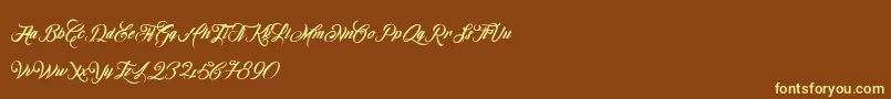 OmbelineLudolphides Font – Yellow Fonts on Brown Background