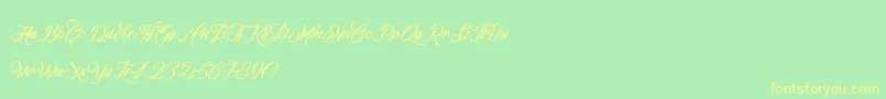 OmbelineLudolphides Font – Yellow Fonts on Green Background