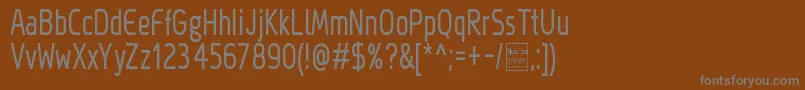 Czcionka MegiSansNarrowDemo – szare czcionki na brązowym tle