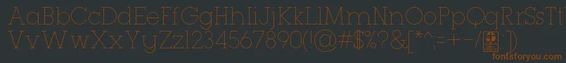 Fonte TypoGeoslabThinDemo – fontes marrons em um fundo preto