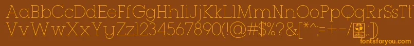 TypoGeoslabThinDemo-Schriftart – Orangefarbene Schriften auf braunem Hintergrund