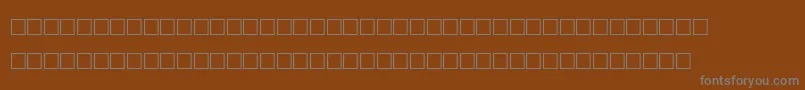 Шрифт AgaArabesqueDesktop – серые шрифты на коричневом фоне
