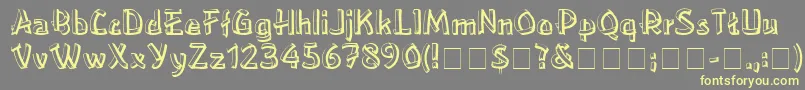 LowereastsideMedium-Schriftart – Gelbe Schriften auf grauem Hintergrund